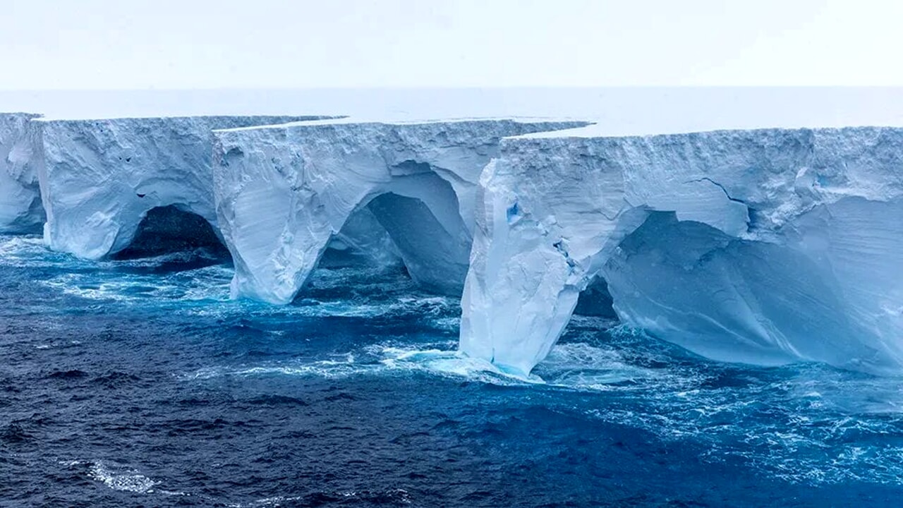 Ice arches and caves: the world's largest iceberg is crumbling