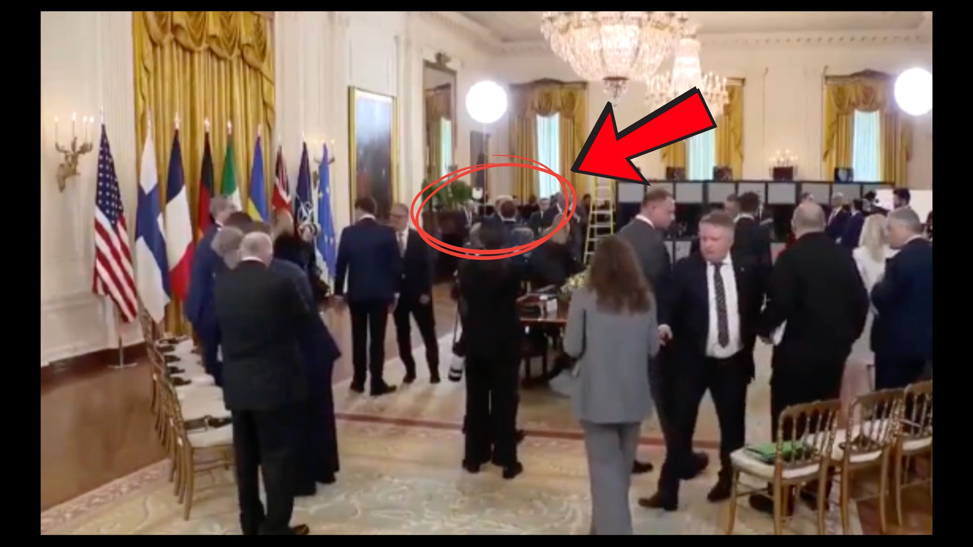 A microphone captures the phrase for Macron