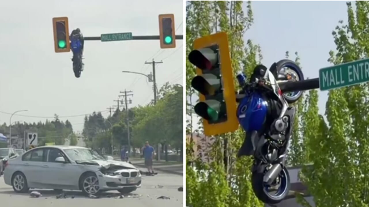 Motorcycle "skewered" in the traffic lights after a flight: the collision with a car at the intersection in Canada
