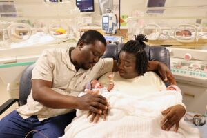 She thinks she is pregnant with triplets, but in reality there were four