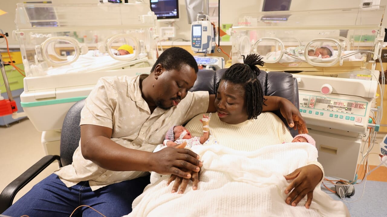 She thinks she is pregnant with triplets, but in reality there were four