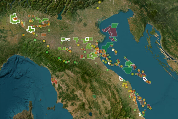 The map shows the hydrocarbon wells (the rods) and the mining titles for the exploration and cultivation of hydrocarbons (colored areas). Source: Webgis Mase-Unmig north-mase deposits
