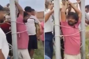 Telephone operator tied to a pole by an angry crowd because 5G isn’t available