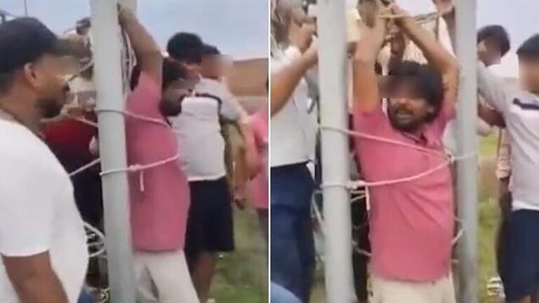 Telephone operator tied to a pole by an angry crowd because 5G isn't available